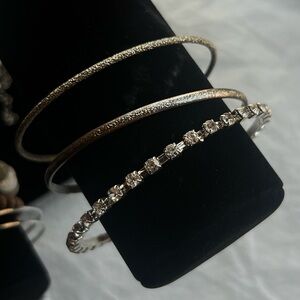 3 Stackable Silver toned bangle bracelets